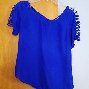 Blue flowy top with shoulder cutouts